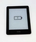A pre-owned Amazon Kindle Voyager (NM460GZ) E-reader in Black.