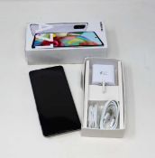 A boxed as new Samsung A71 SM-A715/DS 128GB in Prism Crush Sliver (Checkmend report ID: CM16678082-