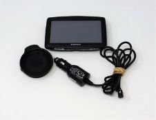 A pre-owned TomTom XXL Sat-Nav with charger and mount.