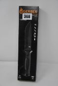 One boxed as new Gerber Strongarm Fixed Blade Knife + Sheaf in black (Partially serrated).