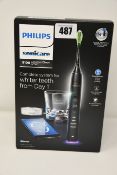 One as new Philips Sonicare Diamondclean smart sonic electric toothbrush.