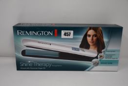 Five boxed as new Remington Shine Therapy Straighteners.