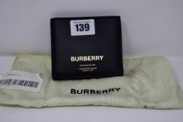 An as new Burberry Horseferry Print leather international bi-fold wallet.