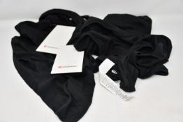Fifteen as new LuluLemon Swiftly Tech Racerback vests in black (Please note security tags