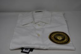 An as new Versace white shirt with logo (Size 38 - RRP £145).