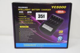 Five boxed as new Youshiko intelligent battery chargers (YC5000).