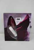 A ladies boxed Womanizer Duo vibrator.