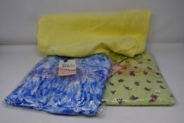 Two items of as new Faithfull The Brand clothing; a Florence mini dress and Willow top (Both XS).