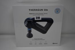 One boxed as new Theragun Elite massager (Smart percussive therapy device).