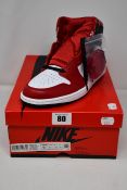 A pair of women's as new Nike Air Jordan 1 High OG (UK 6).