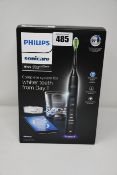 One as new Philips Sonicare Diamondclean smart sonic electric toothbrush.