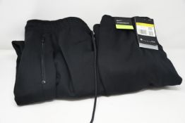 Four pairs of as new Nike Therma pants (1 x S, 1 x M, 2 x L - RRP €75 each).