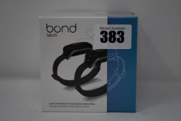 A pair of boxed as new Bond Touch smart bracelets (Bond002).