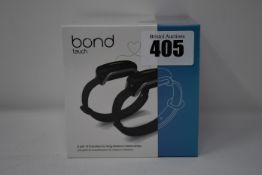 A pair of boxed as new Bond Touch smart bracelets (Bond002).