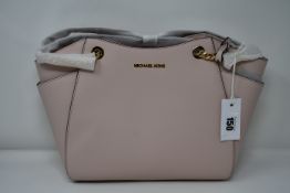 An as new Michael Kors Jet Set bag in powder blush.