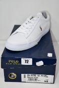 A pair of as new Ralph Lauren Polo Sayer canvas trainers (UK 9).