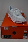 A pair of as new Nike LD Waffle Sacai white trainers (UK 10).