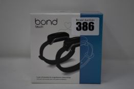 A pair of boxed as new Bond Touch smart bracelets (Bond002).