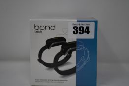 A pair of boxed as new Bond Touch smart bracelets (Bond002).