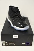 A pair of as new Nike Air Jordan Retro 11 Retro (UK 8).
