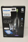 One as new Philips Sonicare Diamondclean smart sonic electric toothbrush.