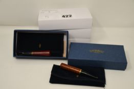 A quantity of five as new Savinelli 1876 Cigarette Holders in an assortment of colours.