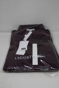 Two as new Lacoste regular fit polo shirts in Bordeaux (2 x US M).