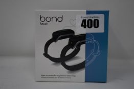 A pair of boxed as new Bond Touch smart bracelets (Bond002).