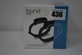 One pair of boxed as new Bond Touch smart bracelets (Bond002).
