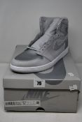 A pair of as new Nike Air Jordan 1 High OG CO JP trainers (UK 12).