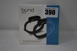 A pair of boxed as new Bond Touch smart bracelets (Bond002).