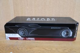 One boxed as new DC Collectibles Batman The Animated Series Batmobile.