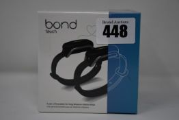 One pair of boxed as new Bond Touch smart bracelets (Bond002).