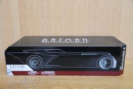 One boxed as new DC Collectibles Batman The Animated Series Batmobile.