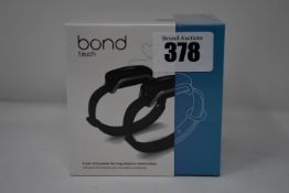 A pair of boxed as new Bond Touch smart bracelets (Bond002).