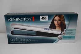 Five boxed as new Remington Shine Therapy Straighteners.