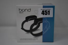 One pair of boxed as new Bond Touch smart bracelets (Bond002).