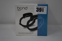 A pair of boxed as new Bond Touch smart bracelets (Bond002).