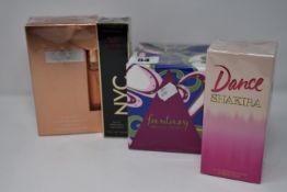 A Shakira Dance eau de toilette (80ml), a Nicole Scherzinger Chosen eau de toilette (100ml and purse