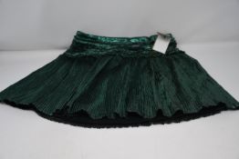 A children's Burberry glitter skirt BNWT, 135cm.