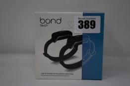 A pair of boxed as new Bond Touch smart bracelets (Bond002).