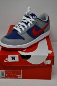 A pair of as new Nike Dunk Low SP trainers (UK 6.5).