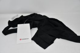 Fifteen as new LuluLemon Swiftly Tech Racerback vests in black (Please note security tags