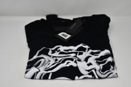 An as new Versace T-shirt (XS - RRP £125).