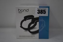 A pair of boxed as new Bond Touch smart bracelets (Bond002).