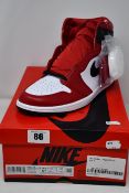 A pair of women's as new Nike Jordan 1 High OG trainers (UK 7).
