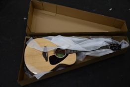 A boxed as new Yamaha acoustic guitar (FS800).