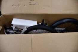 A boxed as new Motiv The Spark electric bike in black (EN15194) (Key for charger missing).
