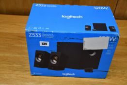 One boxed as new Logitech Z533 Multimedia Sound System (2.1 PC speaker set).