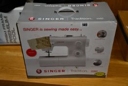 One boxed Singer Tradition 2282 Sewing Machine.